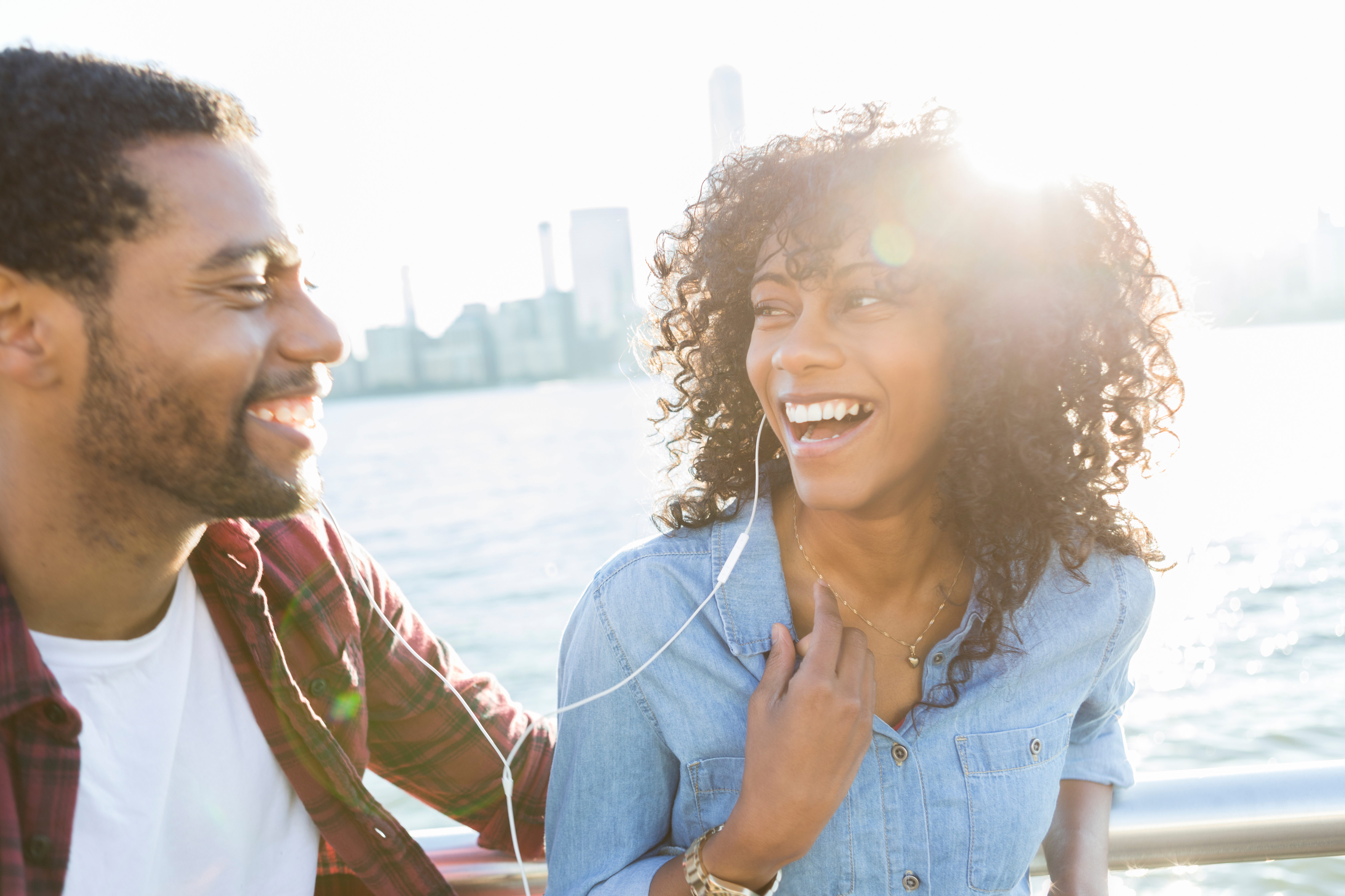 Black couple listening to music