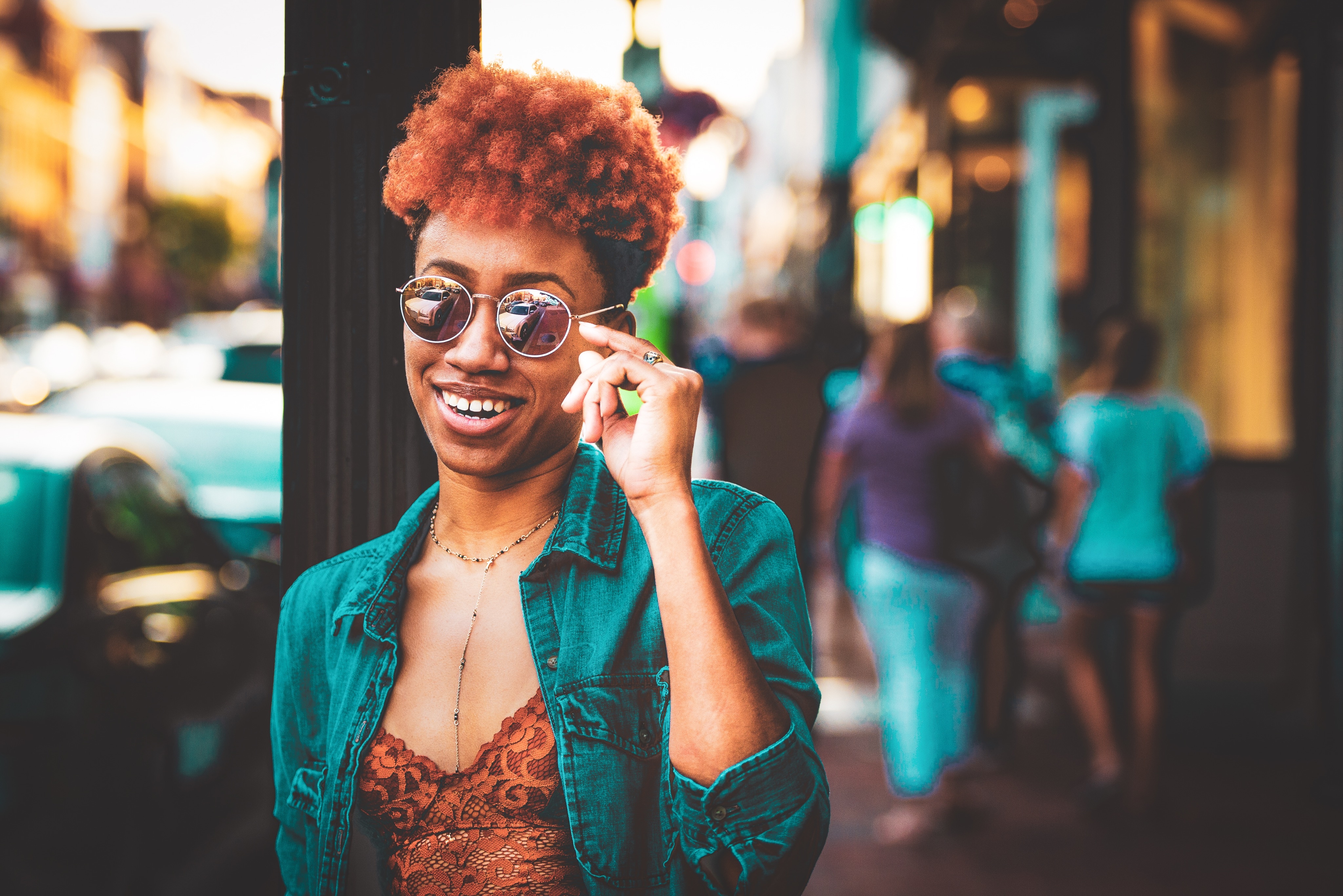 Black girl with short natural hair and sunglasses