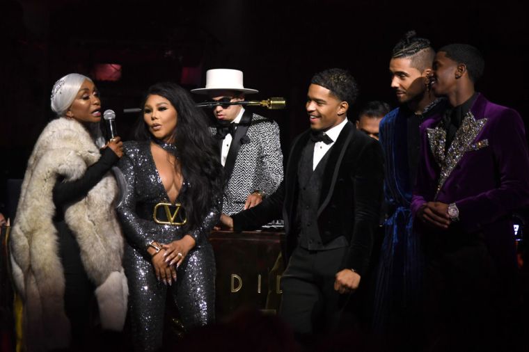 Janice Combs, Lil Kim, Justin Dior Combs, Quincy Combs, and Christian Casey Combs speak onstage