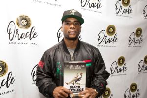 Charlamagne Tha God Signs Copies Of "Black Privilege"