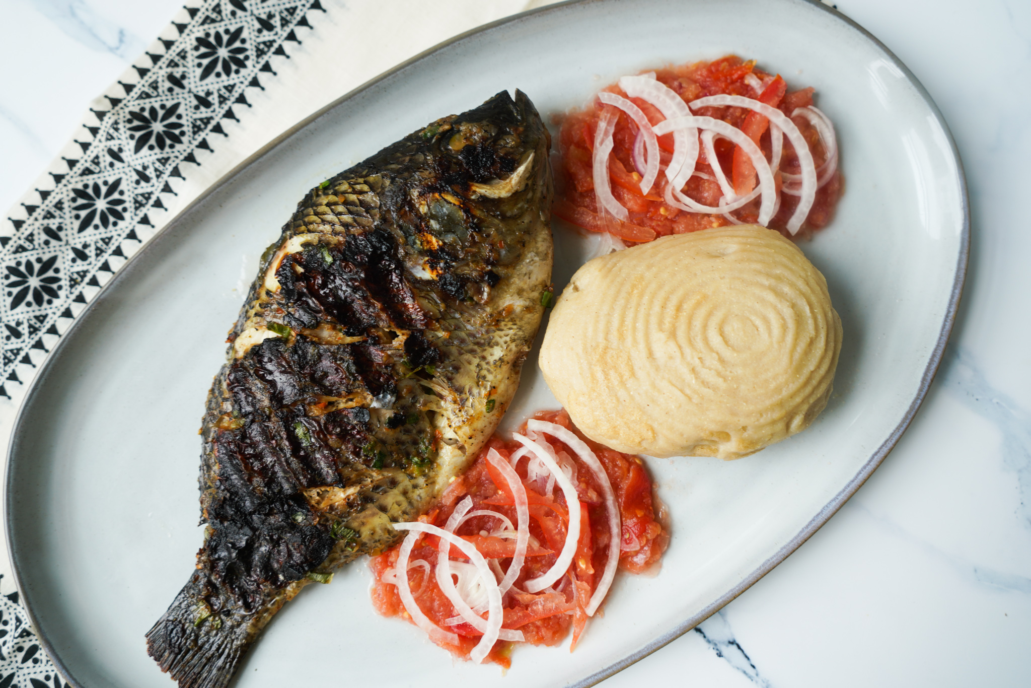 Banku and Tilapia | Global Gourmet