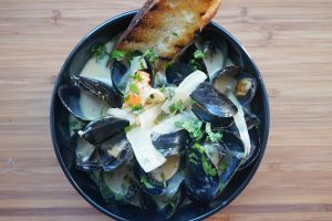Mussels and Octopus in a Coconut Curry Broth with Grilled French Bread