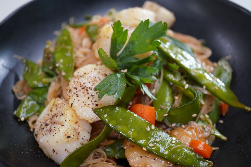 Crispy Honey Scallops Over Garlic Rice Noodles